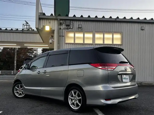 トヨタ エスティマ アエラス Gパッケージ 静岡県 2006(平18)年 16万km ミディアムシルバーメタリック ユーザー買取車両/純正HDDナビ（NHDP-W56S）/[AM/FM/CD/TV/DVD]/純正17インチAW/純正キセノンヘッドライト/エンジンスタートボタン/スマートキー/MTモード付AW/クルーズコントロール/WAC/ETC/フリップダウンモニター/3列シート/オットマン/ウォークスルー/パワーシート（D席のみ）/両側パワースライドドア/AFS/保証書/取扱説明書