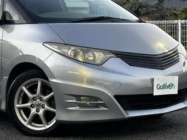 トヨタ エスティマ アエラス Gパッケージ 静岡県 2006(平18)年 16万km ミディアムシルバーメタリック ユーザー買取車両/純正HDDナビ（NHDP-W56S）/[AM/FM/CD/TV/DVD]/純正17インチAW/純正キセノンヘッドライト/エンジンスタートボタン/スマートキー/MTモード付AW/クルーズコントロール/WAC/ETC/フリップダウンモニター/3列シート/オットマン/ウォークスルー/パワーシート（D席のみ）/両側パワースライドドア/AFS/保証書/取扱説明書