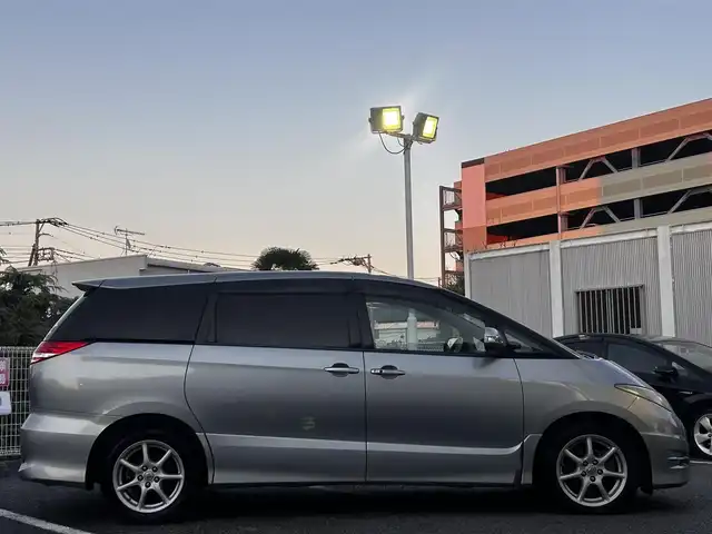 トヨタ エスティマ アエラス Gパッケージ 静岡県 2006(平18)年 16万km ミディアムシルバーメタリック ユーザー買取車両/純正HDDナビ（NHDP-W56S）/[AM/FM/CD/TV/DVD]/純正17インチAW/純正キセノンヘッドライト/エンジンスタートボタン/スマートキー/MTモード付AW/クルーズコントロール/WAC/ETC/フリップダウンモニター/3列シート/オットマン/ウォークスルー/パワーシート（D席のみ）/両側パワースライドドア/AFS/保証書/取扱説明書