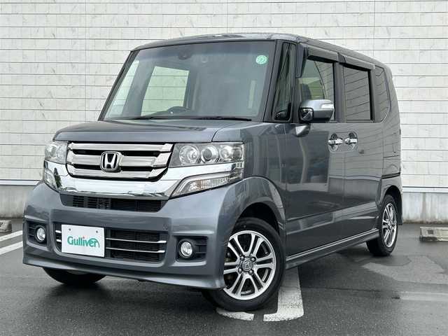 ホンダ Ｎ ＢＯＸ カスタム G Lパッケージ 静岡県 2016(平28)年 3.4万km シャイニンググレーM 純正メモリーナビ/　AM FM CD DVD Bluetooth/ビルトインETC/HIDオートヘッドランプ/片側パワースライドドア/純正14インチアルミホイール/純正フロアマット/スマートキー＆プッシュスタート/リアサンシェード/フロントフォグランプ/スマートシティブレーキサポート/フルセグTV/バックモニター/前後ドライブレコーダー