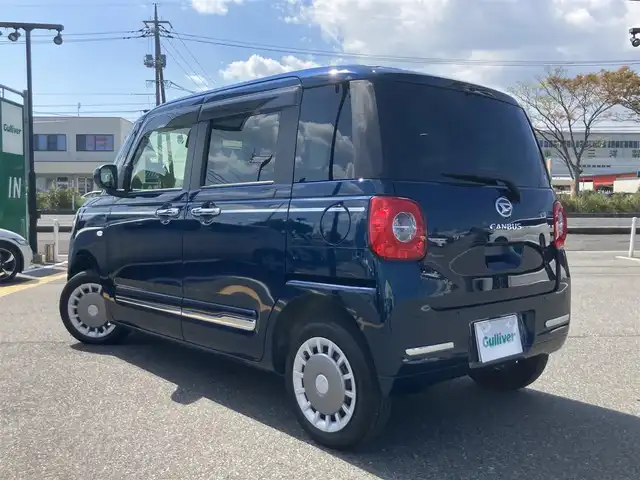 ダイハツ ムーヴ キャンバス セオリー G ターボ 鳥取県 2024(令6)年 1万km レーザーブルークリスタルシャイン ４・W・D/ターボ車/純正ナビ/フルセグ/CD/DVD/BT/全方位カメラ・ETC/スマートアシスト/レーンキープアシスト/レーダークルーズコントロール/両側パワースライドドア/ドライブレコーダー/前席シートヒーター/LEDヘットライト/オートハイビーム/保温機能付きカップホルダー/プッシュエンジンスタート/フォグライト/スペアキー