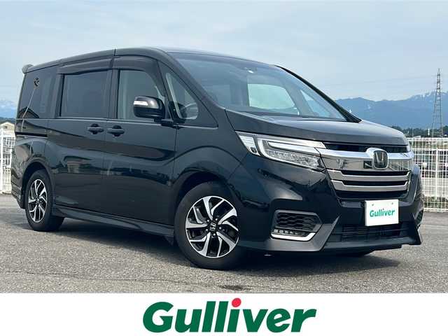 ホンダ ステップワゴン スパーダ ホンダセンシング 富山県 2017(平29)年 6.2万km プレミアムスパークルブラックパール ７インチストラーダナビ(CN-RE04D)　/両側パワースライドドア　/クルーズコントロール　/衝突被害軽減ブレーキ　/わくわくゲート　/バックカメラ　/スペアキー　/ＵＳＢ入力端子　/純正ビルトインＥＴＣ　/ＬＥＤヘッドライト/取扱説明書/保証書/ナビ取扱説明書