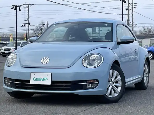 フォルクスワーゲン ザ・ビートル デザイン 道央・札幌 2013(平25)年 13.3万km デニムブルー ワンオーナー/社外メモリーナビ/AM/FM/CD/DVD/SD/AUX/フルセグ/横滑り防止装置/クルーズコントロール/ETC/革巻きステアリング/MTモード付AT/リモコンキー/ハロゲンヘッドライト/フォグランプ/ヘッドライトレベライザー/電動格納ミラー/ヒーテッドドアミラー/ウィンカーミラー/純正フロアマット/スペアキー/社外AW付冬タイヤ積込/215/65/R15/2017年/山5mm