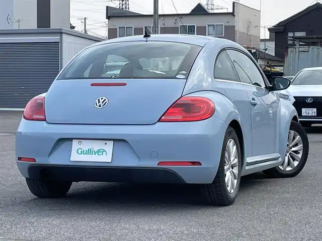 フォルクスワーゲン ザ・ビートル デザイン 道央・札幌 2013(平25)年 13.3万km デニムブルー ワンオーナー/社外メモリーナビ/AM/FM/CD/DVD/SD/AUX/フルセグ/横滑り防止装置/クルーズコントロール/ETC/革巻きステアリング/MTモード付AT/リモコンキー/ハロゲンヘッドライト/フォグランプ/ヘッドライトレベライザー/電動格納ミラー/ヒーテッドドアミラー/ウィンカーミラー/純正フロアマット/スペアキー/社外AW付冬タイヤ積込/215/65/R15/2017年/山5mm