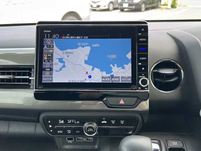 ホンダ Ｎ ＷＧＮ カスタム Lターボ ホンダS 石川県 2021(令3)年 7.7万km プレミアムアガットブラウンP ワンオーナー/ホンダセンシング/・衝突軽減ブレーキ/・誤発信抑制機能/・渋滞追従機能付アダプティブクルーズコントロール/・斜線維持支援システム/・路外逸脱抑制機能/・オートハイビーム/純正メモリナビゲーション/【CD・DVD・Bluetooth・SD・フルセグTV】/型番：VXU-217XBi/リヤソナーセンサー/ビルトインETC/バックカメラ/LEDヘッドライト/・オートライト/・フォグランプ/スマートキー/・プッシュスタート/本革巻きステアリング/・ステアリングリモコン/・パドルシフト/ヘッドライトレベライザー/純正フロアマット/新車時保証書/取扱説明書