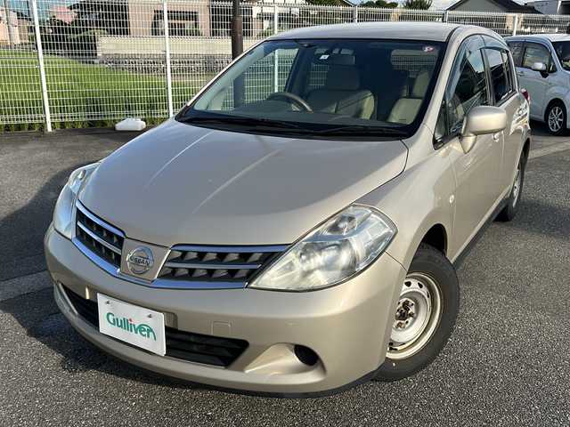 日産 ティーダ 15M SV +プラズマ 富山県 2012(平24)年 6.4万km シルキーベージュ ハーフレザーシート/純正メモリーナビ(MP311D-A)/DVD/BT/フルセグ/ビルトインETC/電動格納ミラー/オートライト/純正ドアバイザー/純正フロアマット/キーレス