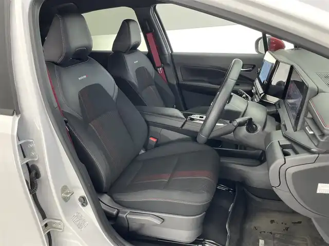 日産 オーラ ニスモ 愛知県 2022(令4)年 1.8万km ピュアホワイトパール 純正９型ナビＴＶ　ＨＤＭＩ　デジタルインナーミラー　全方位カメラ　プロパイロット　シートヒータ　ワイヤレス充電　純正ニスモスポイラー　電動パーキングブレーキ　ＬＥＤオートライト　オートホールド　ハンドル支援　エマージェンシーブレーキ　コーナーセンサー　ETC2.0　フォグランップ　禁煙車
