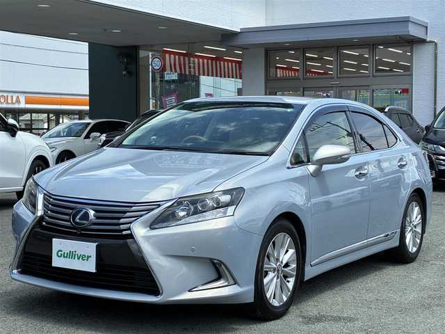 レクサス ＨＳ 250h バージョンI 熊本県 2013(平25)年 14.1万km ムーンライトオパール 純正ＨＤＤナビ/【フルセグTV/CD/DVD/SD/USB/AUX/BT】/バックカメラ/クルーズコントロール/純正17インチAW/コーナーセンサー/革シート/前席パワーシート（D席メモリ付）/前席シートヒーター/前席シートクーラー/ドライブレコーダー/ＬＥＤヘッドライト/オートライト/フォグランプ/ビルトインＥＴＣ/ステアリングリモコン/純正フロアマット/純正ドアバイザー