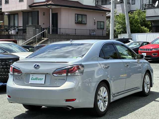 レクサス ＨＳ 250h バージョンI 熊本県 2013(平25)年 14.1万km ムーンライトオパール 純正ＨＤＤナビ/【フルセグTV/CD/DVD/SD/USB/AUX/BT】/バックカメラ/クルーズコントロール/純正17インチAW/コーナーセンサー/革シート/前席パワーシート（D席メモリ付）/前席シートヒーター/前席シートクーラー/ドライブレコーダー/ＬＥＤヘッドライト/オートライト/フォグランプ/ビルトインＥＴＣ/ステアリングリモコン/純正フロアマット/純正ドアバイザー