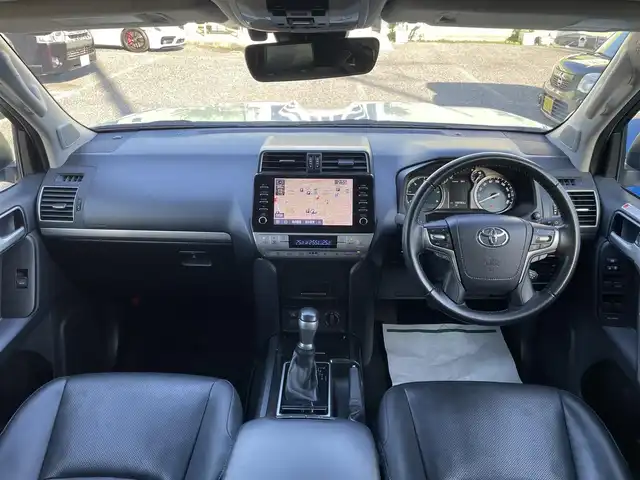 トヨタ ランドクルーザー プラド TX Lパッケージ 埼玉県 2021(令3)年 10万km ホワイトパールクリスタルシャイン ワンオーナー車/サンルーフ/黒革シート/前席シートヒーター＆エアシート/メーカーOPナビTV/パノラミックビューモニター/クリアランスソナー/LEDヘッドライト/ルーフレール/レーダークルーズコントロール/セーフティセンス/プッシュスタート/スマートキー/保証書付整備手帳/取扱説明書