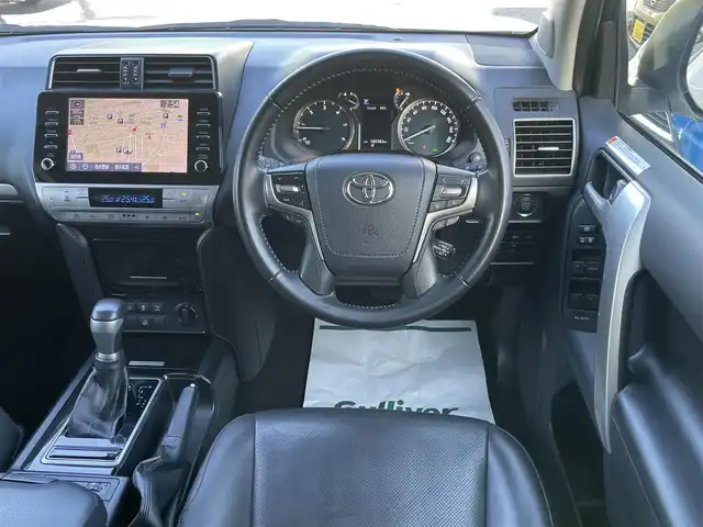 トヨタ ランドクルーザー プラド TX Lパッケージ 埼玉県 2021(令3)年 10万km ホワイトパールクリスタルシャイン ワンオーナー車/サンルーフ/黒革シート/前席シートヒーター＆エアシート/メーカーOPナビTV/パノラミックビューモニター/クリアランスソナー/LEDヘッドライト/ルーフレール/レーダークルーズコントロール/セーフティセンス/プッシュスタート/スマートキー/保証書付整備手帳/取扱説明書