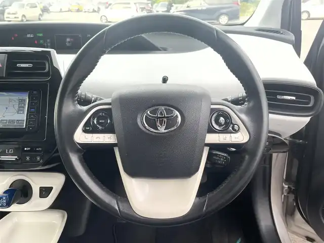トヨタ プリウス Sセーフティプラス 愛媛県 2018(平30)年 8万km スティールブロンドM KENWOODナビ　/AM/FM/CD/DVD/BT/フルセグTV　/バックカメラ　/トヨタセーフティセンス/レーダークルーズコントロール/車線逸脱防止装置/衝突被害軽減装置/先進車発進お知らせ装置/横滑り防止装置/オートマチックハイビーム/ドライブレコーダー　/シンプルインテリジェントパーキングアシスト　/ETC/ISOFIX/純正ドアバイザー/現状サマー(純正AW)(195/65/R１５)/DUNLOP ENASAVE
