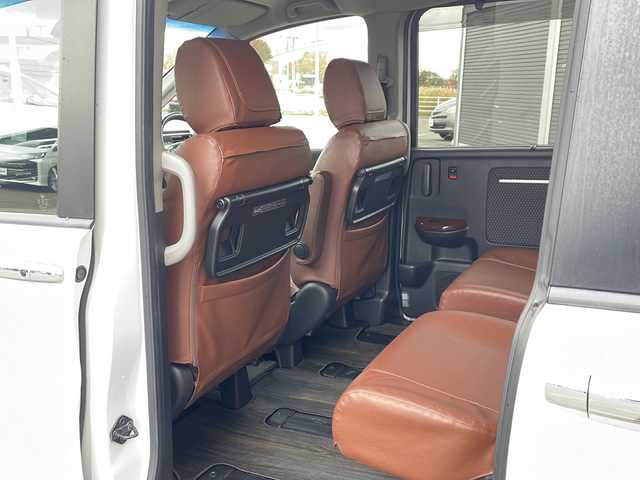 ホンダ ステップワゴン スパーダ ホンダセンシング 道東・釧路十勝 2017(平29)年 9.2万km ホワイトオーキッドパール ・4WD/・純正9インチSDナビ/(BT CD DVD フルセグ FM AM)/・バックカメラ/・純正11インチフリップダウンモニター/・クルーズコントロール/・両側パワースライドドア/・ヒーテッドドアミラー/・社外エンジンスターター/・電動格納ミラー/・パドルシフト/・ステアリングスイッチ/・革調シートカバー/・ホンダセンシング/・衝突軽減装置/・車線逸脱警報装置/・フロントワイパーデアイサー/・MTモード付AT/・オートライト/・LEDヘッドライト/・フォグライト/・スマートキー/・プッシュスタート/・純正１６インチアルミホイール