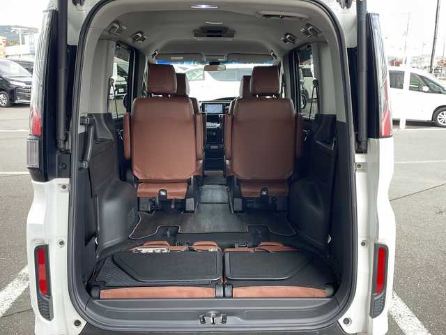 ホンダ ステップワゴン スパーダ ホンダセンシング 道東・釧路十勝 2017(平29)年 9.2万km ホワイトオーキッドパール ・4WD/・純正9インチSDナビ/(BT CD DVD フルセグ FM AM)/・バックカメラ/・純正11インチフリップダウンモニター/・クルーズコントロール/・両側パワースライドドア/・ヒーテッドドアミラー/・社外エンジンスターター/・電動格納ミラー/・パドルシフト/・ステアリングスイッチ/・革調シートカバー/・ホンダセンシング/・衝突軽減装置/・車線逸脱警報装置/・フロントワイパーデアイサー/・MTモード付AT/・オートライト/・LEDヘッドライト/・フォグライト/・スマートキー/・プッシュスタート/・純正１６インチアルミホイール