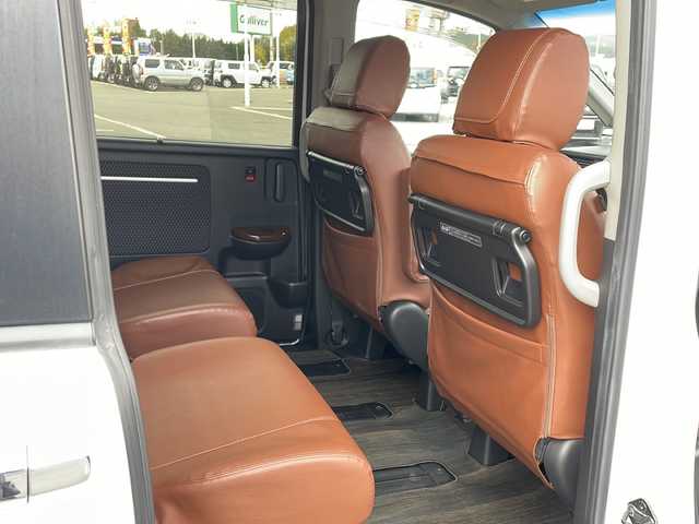 ホンダ ステップワゴン スパーダ ホンダセンシング 道東・釧路十勝 2017(平29)年 9.2万km ホワイトオーキッドパール ・4WD/・純正9インチSDナビ/(BT CD DVD フルセグ FM AM)/・バックカメラ/・純正11インチフリップダウンモニター/・クルーズコントロール/・両側パワースライドドア/・ヒーテッドドアミラー/・社外エンジンスターター/・電動格納ミラー/・パドルシフト/・ステアリングスイッチ/・革調シートカバー/・ホンダセンシング/・衝突軽減装置/・車線逸脱警報装置/・フロントワイパーデアイサー/・MTモード付AT/・オートライト/・LEDヘッドライト/・フォグライト/・スマートキー/・プッシュスタート/・純正１６インチアルミホイール