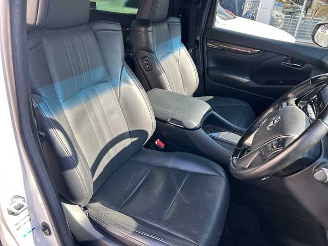 トヨタ ヴェルファイア ハイブリット エグゼクティブ ラウンジ 東京都 2018(平30)年 5.7万km ホワイトパールクリスタルシャイン モデリスタフルエアロ/ツインムーンルーフ/純正SDナビ/　Bluetooth/フルセグTV/DVD/CD/Blu-ray/HDMI/純正フリップダウンモニター/JBLプレミアムサウンドシステム/両側パワースライドドア/ビルトインETC2.0/レーダークルーズコントロール/パノラミックビューモニター/デジタルインナーミラー/プリクラッシュセーフティ/レーントレーシングアシスト/ロードサインアシスト/アダプティブハイビームシステム/レザーシート/パワーシート/シートヒーター/シートクーラー/インテリジェントクリアランスソナー/ブラインドスポットモニター/デジタルインナーミラー/パワーバックドア/3眼LEDヘットライト/LEDフォグランプ/LEDコーナリングランプ/シーケンシャルターンランプ/純正17インチアルミホイール/ステアリングヒーター/ステアリングスイッチ/置くだけ充電/AC100V電源/スペアキー×3/後席サンシェード/プッシュスタート/スマートキー/電動オート格納ミラー/ウインカーミラー/フロアマット/ドアバイザー/保証書/取扱説明書