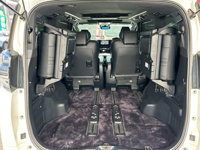 トヨタ ヴェルファイア ハイブリット エグゼクティブ ラウンジ 東京都 2018(平30)年 5.7万km ホワイトパールクリスタルシャイン モデリスタフルエアロ/ツインムーンルーフ/純正SDナビ/　Bluetooth/フルセグTV/DVD/CD/Blu-ray/HDMI/純正フリップダウンモニター/JBLプレミアムサウンドシステム/両側パワースライドドア/ビルトインETC2.0/レーダークルーズコントロール/パノラミックビューモニター/デジタルインナーミラー/プリクラッシュセーフティ/レーントレーシングアシスト/ロードサインアシスト/アダプティブハイビームシステム/レザーシート/パワーシート/シートヒーター/シートクーラー/インテリジェントクリアランスソナー/ブラインドスポットモニター/デジタルインナーミラー/パワーバックドア/3眼LEDヘットライト/LEDフォグランプ/LEDコーナリングランプ/シーケンシャルターンランプ/純正17インチアルミホイール/ステアリングヒーター/ステアリングスイッチ/置くだけ充電/AC100V電源/スペアキー×3/後席サンシェード/プッシュスタート/スマートキー/電動オート格納ミラー/ウインカーミラー/フロアマット/ドアバイザー/保証書/取扱説明書