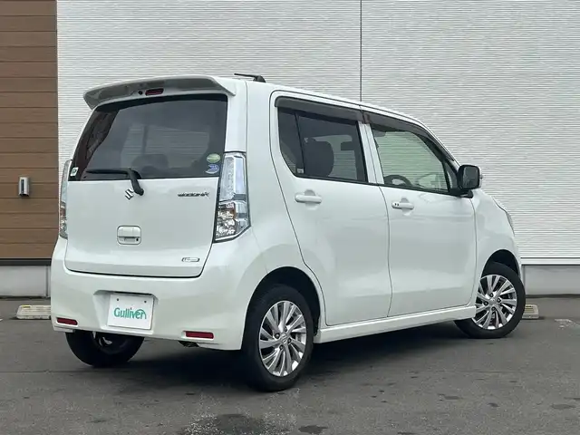 スズキ ワゴンＲ FZ 秋田県 2014(平26)年 4.8万km クリスタルホワイトP ４WD/純正オーディオ（AM/FM/CD)/衝突軽減システム/社外アルミ/スマートキー/アイドリングストップ/プッシュスタート/純正エアロパーツ/前席シートヒーター/社外フロアマット/純正ドアバイザー/ステアリングスイッチ/オートエアコン/パワーステアリング/パワーウィンドウ/レベライザー/電動格納ウィンカーミラー/横滑り防止/盗難防止装置/保証書/取扱説明書/記録簿