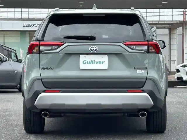 トヨタ ＲＡＶ４ ハイブリッド アドベンチャー 広島県 2023(令5)年 1.4万km アーバンカーキ ワンオーナー/JAOSバンパーガード/パノラマルーフ/4WD/純正ナビ（Bluetooth/フルセグTV/AM/FM）/バックカメラ/ETC2.0/前後ドライブレコーダー/電動リアゲート/シートヒーター「D/N席」/エアーシート「D/N席」/メモリ付きパワーシート/衝突被害軽減システム/レーダークルーズコントロール/前後コーナーセンサー/ブラインドスポットモニター/標識認識機能/リアクロストラフィックアラート/デジタルインナーミラー/LEDヘッドライト/オートライト/オートマチックハイビーム/フォグライト/プッシュスタート/ステアリングヒーター/ドアバイザー/純正ラゲッジプロテクター/純正フロアマット/純正アルミ/取扱説明書/保証書/スペアキー×1