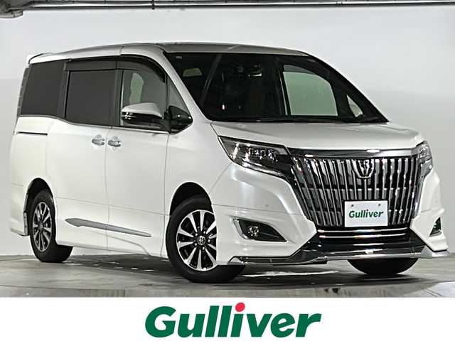 トヨタ エスクァイア Gi 広島県 2019(令1)年 6.4万km ホワイトパールクリスタルシャイン 禁煙/モデリスタエアロ /社外ナビ/CD/DVD/DTV/Bluetooth/バックカメラ/クルーズコントロール/両側パワースライドドア/LEDオートライト/オートマチックハイビーム /LDA/コーナーセンサー /ETC/ドライブレコーダー/純正アルミホイール/スマートキー/プッシュスタート /純正フロアマット