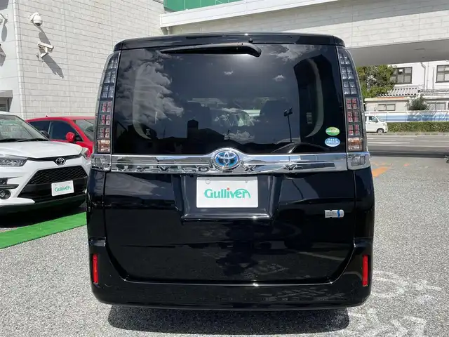 トヨタ ヴォクシー ハイブリッド V 兵庫県 2014(平26)年 8.4万km ブラック 外部検査実施済み/・純正9インチメモリーナビ（NSZT-Y62G）/・地デジ/DVD/BT/・バックカメラ/・ステアリングリモコン/・カロッツェリアツイーター/・ナビTVキャンセラー/・左パワースライドドア/・ビルトインETC/・純正15インチAW/・前席シートヒーター/・置くだけ充電/・オートLEDヘッドランプ/・スペアキー