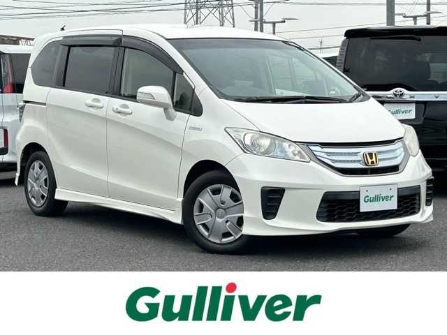 ホンダ フリード ハイブリット ジャストセレクション 千葉県 2012(平24)年 9.6万km プレミアムホワイトパール 純正ナビ/フルセグTV/Bluetooth/DVD/CD/HDMI/ドライブレコーダー/片側パワースライドドア/オートライト/ステアリングスイッチ/横滑り防止装置/純正フロアマット/ウィンカーミラー/取扱説明書/レザー調シートカバー/ドアバイザー