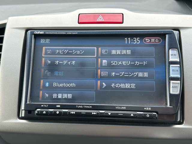 ホンダ フリード ハイブリット ジャストセレクション 千葉県 2012(平24)年 9.6万km プレミアムホワイトパール 純正ナビ/フルセグTV/Bluetooth/DVD/CD/HDMI/ドライブレコーダー/片側パワースライドドア/オートライト/ステアリングスイッチ/横滑り防止装置/純正フロアマット/ウィンカーミラー/取扱説明書/レザー調シートカバー/ドアバイザー