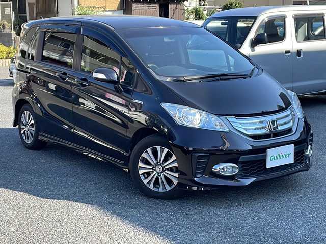 ホンダ フリード ハイブリット ジャストセレクション 大阪府 2012(平24)年 12.7万km プレミアムブラキッシュパール ギャザーズSDナビ/CD.DVD.フルセグ/両側パワースライドドア/バックカメラ/ETC/クルコン/スマートキー/保証書/取説