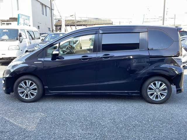 ホンダ フリード ハイブリット ジャストセレクション 大阪府 2012(平24)年 12.7万km プレミアムブラキッシュパール ギャザーズSDナビ/CD.DVD.フルセグ/両側パワースライドドア/バックカメラ/ETC/クルコン/スマートキー/保証書/取説