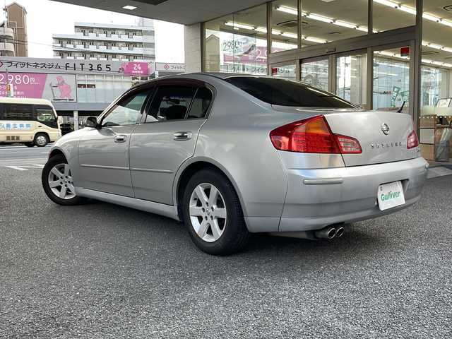 日産 スカイライン 250GT 大阪府 2004(平16)年 9万km ダイヤモンドシルバー 純正DVDナビ/AM/FM/ドアバイザー/リモコンキー/スペアキー/取扱説明書