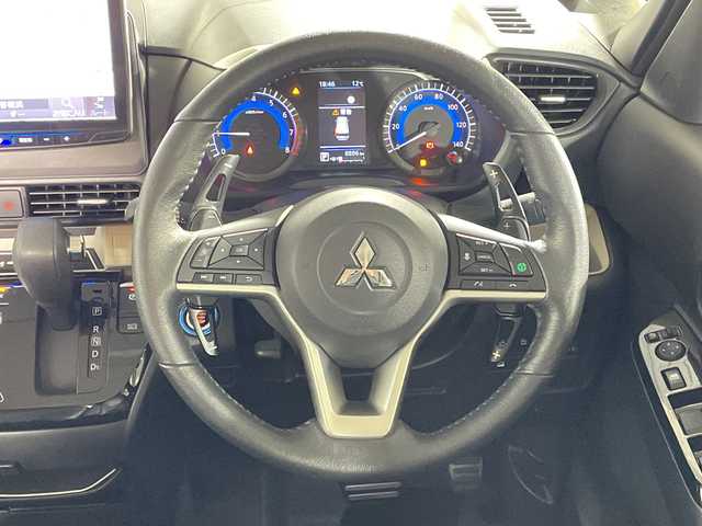 三菱 デリカミニ T プレミアム 福岡県 2023(令5)年 0.9万km アメジストブラック/シルキーホワイト ワンオーナー純正メモリーナビフルセグTVアラウンドビューモニター両側パワースライドドアマイパイロットレーダークルーズコントロールデジタルルームミラーハーフレザーシートe-アシスト衝突被害軽減ブレーキ踏み間違い衝突防止アシスト車線逸脱警報システム車線逸脱防止支援機能オートマチックハイビームふらつき警報前方衝突予測警報標識検知システム先行車発進通知LEDヘッドライトスマートキービルトインETCドライブレコーダー前席シートヒーターヒルスタートアシスト/保証書取扱説明書