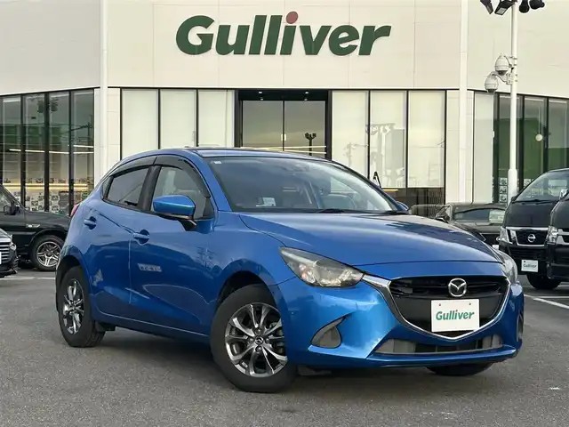 マツダ デミオ 13S ツーリング 長崎県 2016(平28)年 6.1万km ダイナミックブルーマイカ 純正SDナビ/　（BT/CD/AM/FM/フルセグTV)/ビルトインＥＴＣ/オートハイビーム/前席シートヒーター/スマートキー/プッシュスタート/アイドリングストップ/衝突軽減ブレーキ/レーンアシスト/純正ヘッドライト/純正アルミホイール/スペアキー１本