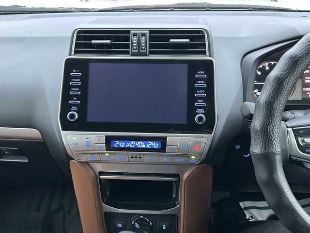 トヨタ ランドクルーザー プラド TX-L 70thアニバーサリーLTD 鹿児島県 2022(令4)年 1.4万km ホワイトパールクリスタルシャイン 純正ナビ/Bluetooth/DVD/エンジンスタートボタン/ワンオーナー/パワーステアリング/パワーウインドウ/4WD/アイドリングストップ/スマートキー/ETC2.0/全周囲車外カメラ/電動リアゲート/ドライブレコーダー/純正フロアマット/パワーシート/アルミホイール/ABS/横滑り防止装置/コーナーセンサー/レーンアシスト/盗難防止装置