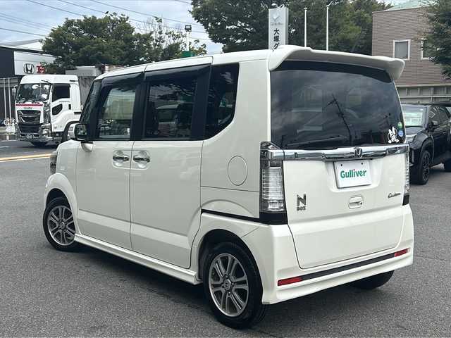 ホンダ Ｎ ＢＯＸ カスタム G Lパッケージ 鳥取県 2013(平25)年 14.6万km プレミアムホワイトパール ワンオーナー/純正ナビ(VXM-128VS)/ワンセグテレビ/バックカメラ/Ｌパッケージ/フルオート・エアコンディショナー/ナビ装着用スペシャルパッケージ/ディスチャージヘッドライト(オートライトコントロール機構付)/アイドリングストップシステム/ドアバイザー/プッシュスタート/片側パワースライドドア/ETC