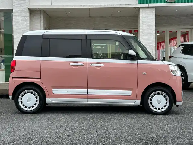 ダイハツ ムーヴ キャンバス ストライプス G 千葉県 2022(令4)年 1万km シャイニングホワイトパール/アプリコットピンクメタリック 大型ディスプレイオーディオ/Bluetooth／フルセグ／/置くだけ充電/電動パーキング/ブレーキホールド/HDMI/バックカメラ/シートヒーター/両側電動スライドドア/コーナーセンサー/スペアキー/スマートキー/プッシュスタート