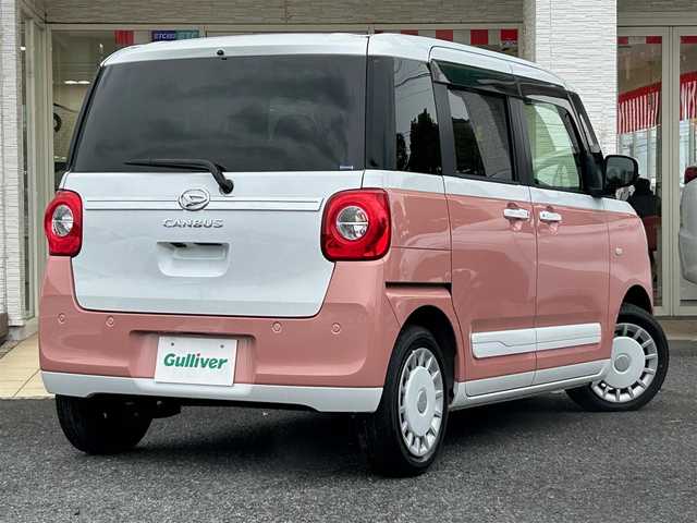 ダイハツ ムーヴ キャンバス ストライプス G 千葉県 2022(令4)年 1万km シャイニングホワイトパール/アプリコットピンクメタリック 大型ディスプレイオーディオ/Bluetooth／フルセグ／/置くだけ充電/電動パーキング/ブレーキホールド/HDMI/バックカメラ/シートヒーター/両側電動スライドドア/コーナーセンサー/スペアキー/スマートキー/プッシュスタート
