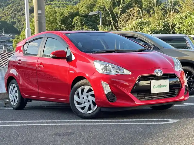 トヨタ アクア G ブラックソフトレザーセレ 長崎県 2015(平27)年 6.7万km スーパーレッドⅤ ワンオーナー/取扱説明書/純正SDナビ(AM/FM/BTフルセグTV)/プッシュスタート/スマートキー/ETC/ステアリングスイッチ/革巻きステアリング/追従無しクルーズコントロール/ドライブモードセレクト/前席シートヒーター/手動光軸調整ダイヤル/オートライト/電格ミラー/ドアバイザー/純正フロアマット/ABS/VSC/イモビライザーシステム/車両接近通報/SRSダブルエアバッグ/ISOFIX/ナノイー