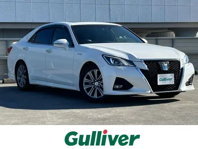 トヨタ クラウン ハイブリッド アスリートG 静岡県 2018(平30)年 5.7万km ホワイトパールクリスタルシャイン サンルーフ/トヨタセーフティーセンス/・プリクラッシュセーフティシステム/・レーンディパーチャーアラート/・アダプティブハイビームシステム/・オートマチックハイビーム/・レーダークルーズコントロール/純正8インチナビ/FM/AM/CD/DVD/Blue-ray/Bluetooth/ブラインドスポットモニター/ハンドルヒーター/レザーシート/前席シートヒーター/前席エアシート/バックカメラ/純正17AW/ビルトインETC2.0