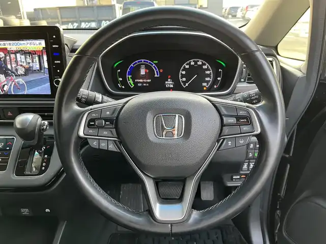 ホンダ オデッセイ ハイブリッド e:HEVアブソルート EX 滋賀県 2021(令3)年 1.6万km プレミアムヴィーナスブラックP 禁煙車/純正ナビ/（CD/DVD/SD/Bluetooth/フルセグTV）/全方位カメラ/純正フリップダウンモニター/ビルトインETC/前後ドライブレコーダー/両側電動スライドドア/パワーバックドア/路外逸脱抑制機能/レーンキープアシストシステム/ブラインドスポットモニター/衝突被害軽減ブレーキ/クリアランスソナー/標識認識機能/電動パーキングブレーキ/オートホールドブレーキ/革巻きステアリング/アダプティブクルーズコントロール/ステアリングリモコン/ハーフレザーシート/前席シートヒーター/前席パワーシート/LEDヘッドライト/フォグランプ/オートヘッドライト/カーテンエアバッグ