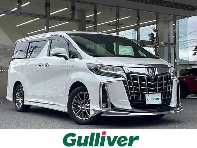 トヨタ アルファードハイブリット エグゼクティブ ラウンジ S 福島県 2019(令1)年 4.7万km ホワイトパールクリスタルシャイン 登録時走行距離：46168km/４WD/ワンオーナー/純正SDナビ/ (フルセグTV/BT/CD/DVD/HDMI//AM/FM)/バックカメラ/全周囲カメラ/モデリスタエアロ/サンルーフ/フリップダウンモニター/デジタルインナーミラー/前後ドライブレコーダー/クルーズコントロール/レザーシート/パワーシート/ (D席/N席)/シートヒーター/ (D席/N席)/メモリーシート/ステアリングヒーター/ステアリングスイッチ/オットマン/キャプテンシート/パワーバックドア/純正フロアマット/プレミアムサウンド/プッシュスタート/純正17インチAW/LEDヘッドライト/フォグランプ/ドアバイザー/電動格納ミラー/ウィンカーミラー/トヨタセーフティセンス/ ・PKSB/ ・PCS/ ・BSM/ ・RCTA/ ・RSA/横滑り防止装置/オートライト/オートマチックハイビーム/スマートキー/スペアキー×１/保証書/取扱説明書