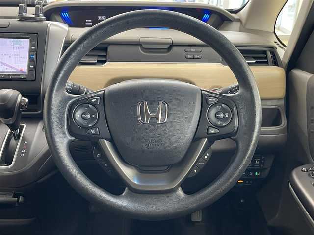 ホンダ フリード G ホンダセンシング 道東・釧路十勝 2018(平30)年 4.1万km クリスタルブラックパール ・4WD/・純正ナビ/CD/SD/BT/・バックカメラ/・両側パワースライドドア/・純正エンジンスターター/・ホンダセンシング/・CMBS/・アダプティブクルーズコントロール/・先行車発進お知らせ/・路外逸脱抑制システム/・レーンキープアシスト/・標識認識機能/・横滑り防止/・ワイパーデアイサー/・ビルトインETC/・LEDヘッドライト/・アイドリングストップ/・前席シートヒーター/・プッシュスタート/・スマートキー/・ドアバイザー/・電格ミラー/・ミラーヒーター/・夏タイヤ15インチホイル積込