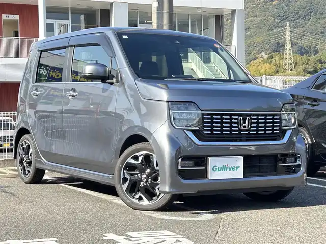 ホンダ Ｎ ＷＧＮ カスタム Lターボ ホンダS 長崎県 2020(令2)年 1.9万km シャイニンググレーM ワンオーナー/純正SDナビ(FM/AM/CD/DVD/BT/フルセグTV)/プッシュスタート/ビルトインETC/レーダークルーズコントロール/パドルシフト/バックカメラ/オートブレーキホールド/電動パーキング/電動ウィンカミラー/ヘッドライトレベライザ/ハーフレザーシート/D席シートヒーター/純正フロアマット/純正アルミホイール/リアソナー/衝突軽減ブレーキ/ABS/横滑り防止装置/車線維持支援システム/レーンデパーチャー/路外逸脱抑制システム/標識認識機能/CMBS警報/ACC先行車検知音/SRSダブルエアバッグ/SRSカーテンエアバッグ/スマートキー/取扱説明書/ナビ取扱説明書/保証書