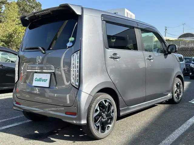 ホンダ Ｎ ＷＧＮ カスタム Lターボ ホンダS 長崎県 2020(令2)年 1.9万km シャイニンググレーM ワンオーナー/純正SDナビ(FM/AM/CD/DVD/BT/フルセグTV)/プッシュスタート/ビルトインETC/レーダークルーズコントロール/パドルシフト/バックカメラ/オートブレーキホールド/電動パーキング/電動ウィンカミラー/ヘッドライトレベライザ/ハーフレザーシート/D席シートヒーター/純正フロアマット/純正アルミホイール/リアソナー/衝突軽減ブレーキ/ABS/横滑り防止装置/車線維持支援システム/レーンデパーチャー/路外逸脱抑制システム/標識認識機能/CMBS警報/ACC先行車検知音/SRSダブルエアバッグ/SRSカーテンエアバッグ/スマートキー/取扱説明書/ナビ取扱説明書/保証書