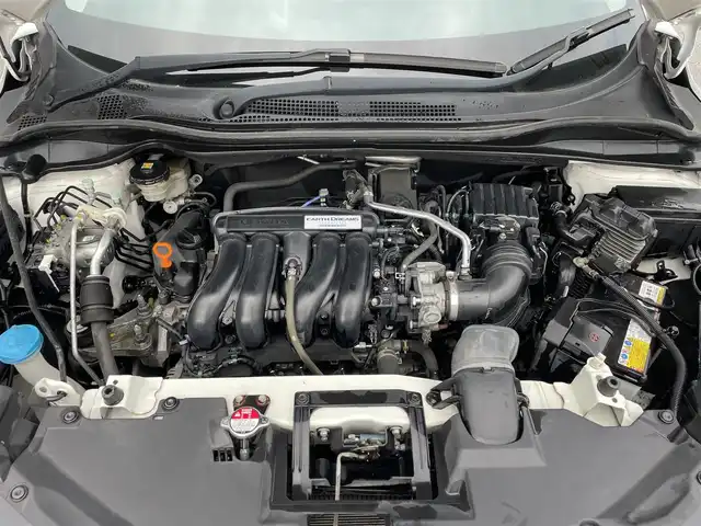 ホンダ ヴェゼル S 滋賀県 2014(平26)年 12.9万km ホワイトオーキッドパール ワンオーナー/社外ナビ/・CD/DVD/革巻きステアリング/ステアリングリモコン/パドルシフト/前後ドライブレコーダー/ETC/クルーズコントロール/前席シートヒーター/ハーフレザーシート/レーダー探知機/無限フロアマット/LEDオートライト/フォグライト/シティブレーキアクティブシステム/シートリフター/電動格納ミラー/スマートキー/スペアキー