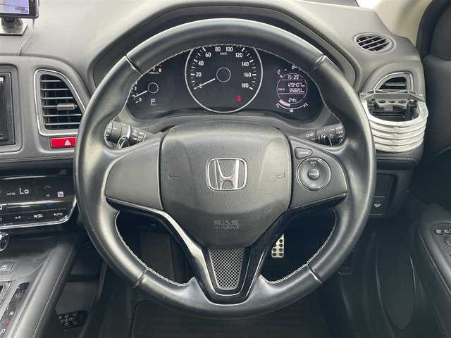 ホンダ ヴェゼル S 滋賀県 2014(平26)年 12.9万km ホワイトオーキッドパール ワンオーナー/社外ナビ/・CD/DVD/革巻きステアリング/ステアリングリモコン/パドルシフト/前後ドライブレコーダー/ETC/クルーズコントロール/前席シートヒーター/ハーフレザーシート/レーダー探知機/無限フロアマット/LEDオートライト/フォグライト/シティブレーキアクティブシステム/シートリフター/電動格納ミラー/スマートキー/スペアキー