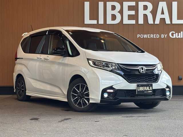 ホンダ フリード モデューロX ホンダセンシング 宮城県 2019(平31)年 4.5万km ホワイトオーキッドパール Gathersナビ/バックカメラ/フルセグTV/AppleCarPlay/ハーフレザー/アイドリングストップ/ACC/レーンキープアシスト/ホンダセンシング/両側パワスラ/前後ドラレコ/ドアバイザー/ステアリングスイッチ/ビルドインETC/LEDヘッドライト/フロントフォグライト/取扱説明書/保証書/スペアキー×１