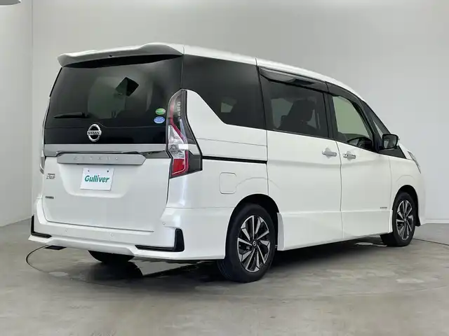 日産 セレナ ハイウェイスター V 新潟県 2019(令1)年 6万km ブリリアントホワイトパール プロパイロット/ストラーダ10型メモリナビ【CN-F1X10D】/　フルセグTV/Bluetooth/CD/DVD/USB/全方位モニター/後席モニター/レーダークルーズコントロール/衝突被害軽減ブレーキ/レーンキープアシスト/BSM(ブラインドスポットモニター)/両側パワースライドドア/前後コーナーセンサー/パーキングアシスト/アイドリングストップ/LEDヘッドライト/オートライト/横滑り防止装置/ステアリングスイッチ/禁煙車