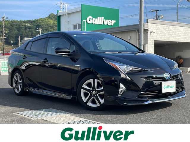 トヨタ プリウス A ツーリングセレクション 山口県 2016(平28)年 16.6万km アティチュードブラックマイカ モデリスタエアロ/純正メモリナビ/Bluetooth/フルセグTV（走行中視聴可）/バックカメラ/トヨタセーフティセンス/横滑り防止装置/レーンキープアシスト/クルーズコントロール/ブラインドスポットモニター/ヘッドアップディスプレイ/前席シートヒーター/レザーシート/ビルトインETC/ステアリングスイッチ/LEDヘッドライト/LEDフォグライト/コーナーセンサー/スマートキー/プッシュスタート/パーキングアシスト/保証書・取説