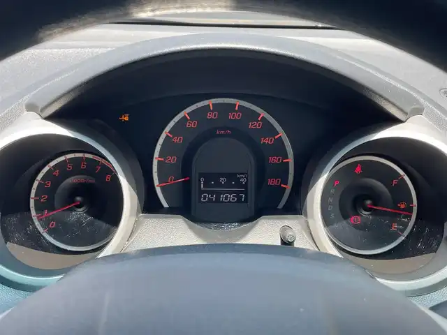 ホンダ フィット G 愛知県 2010(平22)年 4.1万km チタニウムメタリック 純正メーカーナビ（AM/FM/ワンセグ/CD/DVD）/ETC/前後ドラレコ/ドアバイザー/純正フロアマット