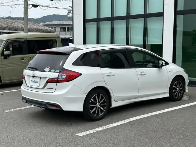 ホンダ ジェイド ハイブリッド 和歌山県 2016(平28)年 12.2万km ホワイトオーキッドパール 社外ナビ/(AM/FM/DVD/Bluetooth)/バックカメラ/衝突軽減ブレーキ/横滑り防止機能/クルーズコントロール/アイドリングストップ/ETC/ドラレコ/プッシュスタート/スマートキー/ハンドルスイッチ/オートライト/カーテンエアバック/ECOモード/純正マット